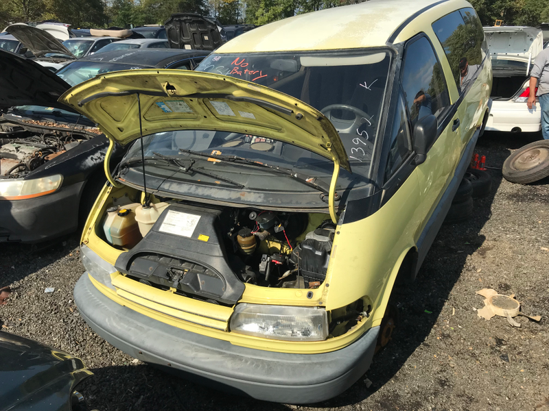 Toyota Previa. This was being actively salvaged as I walked by it.